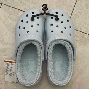 Light blue fuzzy crocs. Mens 9 Women’s 11. brand new with tags